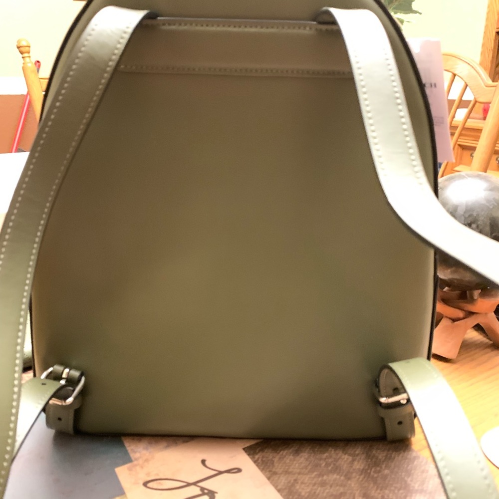 NWT olive green coach backpack with matching wristlet. Backpack is 11”x10”x4”. - Picture 4 of 10
